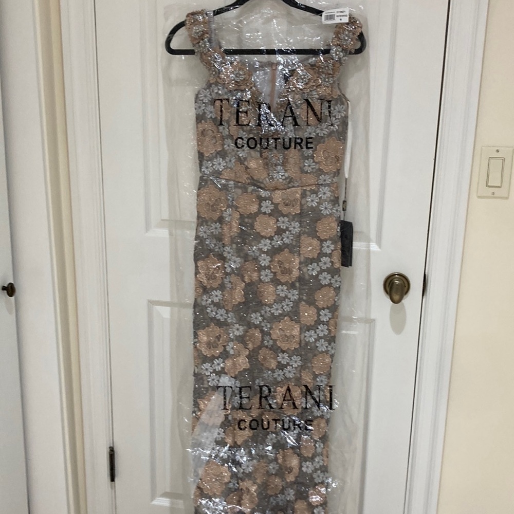 Gorgeous hand made lace fully lined with sweeping train evening gown.